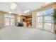 Spacious clubhouse featuring a kitchenette, large windows, and ample seating, ideal for community gatherings at 2662 S Cathay Way # 112, Aurora, CO 80013