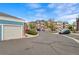Exterior view of the community, featuring a garage and tree-lined streets at 2662 S Cathay Way # 112, Aurora, CO 80013