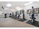 Well-lit gym featuring modern exercise equipment and multiple workout stations at 2662 S Cathay Way # 112, Aurora, CO 80013