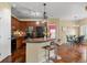 Modern kitchen with wooden cabinets, granite countertops, and stainless steel appliances at 2662 S Cathay Way # 112, Aurora, CO 80013