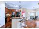 Modern kitchen includes dark cabinets, stainless steel appliances, and a breakfast bar at 2662 S Cathay Way # 112, Aurora, CO 80013