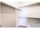 Functional walk-in closet with shelving for organized storage of clothes and accessories at 2662 S Cathay Way # 112, Aurora, CO 80013