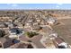 Aerial view of the home showcasing the neighborhood and surrounding community at 156 Chapel Hill Cir, Brighton, CO 80601