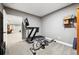 Workout room featuring a treadmill and rowing machine, perfect for home fitness at 156 Chapel Hill Cir, Brighton, CO 80601