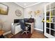 Bright office featuring a modern desk, comfortable chair, and stylish decor at 156 Chapel Hill Cir, Brighton, CO 80601