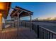 Relaxing back deck showcasing scenic views, designed for outdoor enjoyment and peaceful moments at 35055 E Mississippi Ave, Watkins, CO 80137