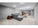 Finished basement with a large recreational area, comfortable seating, and ample storage space offers entertainment potential at 35055 E Mississippi Ave, Watkins, CO 80137