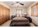 Comfortable bedroom featuring ample storage, a double bed, and natural light creates a serene living space at 35055 E Mississippi Ave, Watkins, CO 80137
