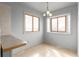 Bright dining area with tile floors, and large windows overlooking the surrounding landscape at 35055 E Mississippi Ave, Watkins, CO 80137