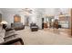 Spacious living room with comfortable seating, open layout, and plenty of natural light provides a welcoming atmosphere at 35055 E Mississippi Ave, Watkins, CO 80137