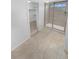 Well-designed bathroom features tile floor, glass shower and walk in closet with custom shelving at 950 Avena Ct, Elizabeth, CO 80107