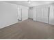 Carpeted bedroom features two closets and an ensuite bathroom at 950 Avena Ct, Elizabeth, CO 80107