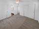 Neutral bedroom featuring a ceiling fan, closet, light walls, and view to bathroom at 950 Avena Ct, Elizabeth, CO 80107