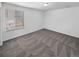 Spacious bedroom featuring plush carpet, a large window with blinds and neutral walls at 950 Avena Ct, Elizabeth, CO 80107