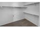 Well organized walk-in closet features carpet, and custom shelving and safe at 950 Avena Ct, Elizabeth, CO 80107