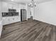 Kitchen featuring white cabinets, stainless steel appliances, hard surface floors, and recessed lighting at 950 Avena Ct, Elizabeth, CO 80107