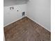 Tiled laundry room with hookups ready for your washer and dryer at 950 Avena Ct, Elizabeth, CO 80107