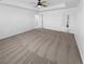 Large main bedroom featuring plush carpet, trey ceiling and open doorways at 950 Avena Ct, Elizabeth, CO 80107