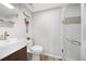 Contemporary bathroom featuring a sleek vanity, modern fixtures, and a frameless glass-enclosed shower at 1250 S Josephine St, Denver, CO 80210