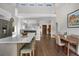 Bright kitchen with an open layout, island, and dining area with lots of space at 1250 S Josephine St, Denver, CO 80210