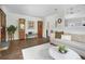 Open concept living room featuring hardwood floors and stylish decor at 1250 S Josephine St, Denver, CO 80210