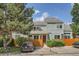 Beautiful home exterior featuring a well-manicured lawn and mature trees at 5150 Buckingham Rd, Boulder, CO 80301