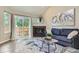 Inviting living room with modern fireplace and natural light at 5150 Buckingham Rd, Boulder, CO 80301
