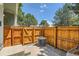 Inviting patio with wooden fencing and ample space for outdoor seating and entertaining at 5150 Buckingham Rd, Boulder, CO 80301