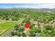 Aerial shot showcases home's location within lush green neighborhood, highlighting convenient access to local amenities at 485 S Pierson St, Lakewood, CO 80226
