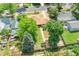 Home aerial view emphasizing the well-manicured backyard, mature trees, and surrounding neighborhood charm at 485 S Pierson St, Lakewood, CO 80226