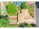 Aerial view of home with a large yard, mature trees, well-maintained roof, and established landscaping at 485 S Pierson St, Lakewood, CO 80226