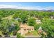 Aerial view of the home highlighting mature landscaping, nearby street, and neighborhood details at 485 S Pierson St, Lakewood, CO 80226