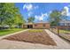 Charming home with a well-maintained lawn, inviting entrance, and mature landscaping at 485 S Pierson St, Lakewood, CO 80226