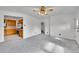 Open-concept living room flows seamlessly into the kitchen, offering a cozy and inviting atmosphere at 485 S Pierson St, Lakewood, CO 80226