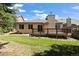 Spacious backyard featuring a wooden deck, perfect for relaxation and outdoor gatherings at 14139 W Warren Dr, Lakewood, CO 80228