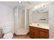 Basement bathroom with vanity and shower space, featuring ceramic flooring and recessed lighting at 14139 W Warren Dr, Lakewood, CO 80228