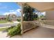 Relaxing covered porch overlooking a quiet street and a well-maintained neighborhood at 14139 W Warren Dr, Lakewood, CO 80228