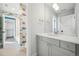 bathroom featuring stylish mirror and sink with playful fish wallpaper that will delight the imagination at 1131 S York St, Denver, CO 80210