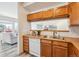 Kitchen with ample counter space and wood cabinets at 990 S Locust St # D, Denver, CO 80224