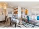 Open concept living room with a view into the kitchen at 990 S Locust St # D, Denver, CO 80224