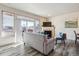 Living room with fireplace and view of balcony at 990 S Locust St # D, Denver, CO 80224