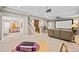 Finished basement with a bar, media area, and bedroom access at 9382 Pike Way, Arvada, CO 80007