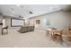 Finished basement with home theater setup, plush carpet, and flexible living space at 9382 Pike Way, Arvada, CO 80007