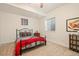 Comfortable carpeted bedroom with natural light and ample space for relaxation and rest at 9382 Pike Way, Arvada, CO 80007