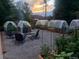 Backyard view featuring garden beds, gravel patio and lounge seating at 1695 S Beach Ct, Denver, CO 80219