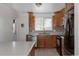 Updated kitchen featuring modern countertops and stainless steel appliances at 1695 S Beach Ct, Denver, CO 80219