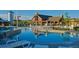 View of the community pool with lounge seating and gathering areas at 2115 Coach House Loop, Castle Rock, CO 80109