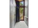 Modern bathroom with tiled walls, glass door to backyard, and rain-style shower head at 182 Ridge Rd, Boulder, CO 80303