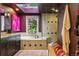Bathroom featuring a soaking tub with window and separate shower with a glass door at 182 Ridge Rd, Boulder, CO 80303