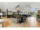 Open concept living and dining area boasts a modern design and seamless flow at 182 Ridge Rd, Boulder, CO 80303